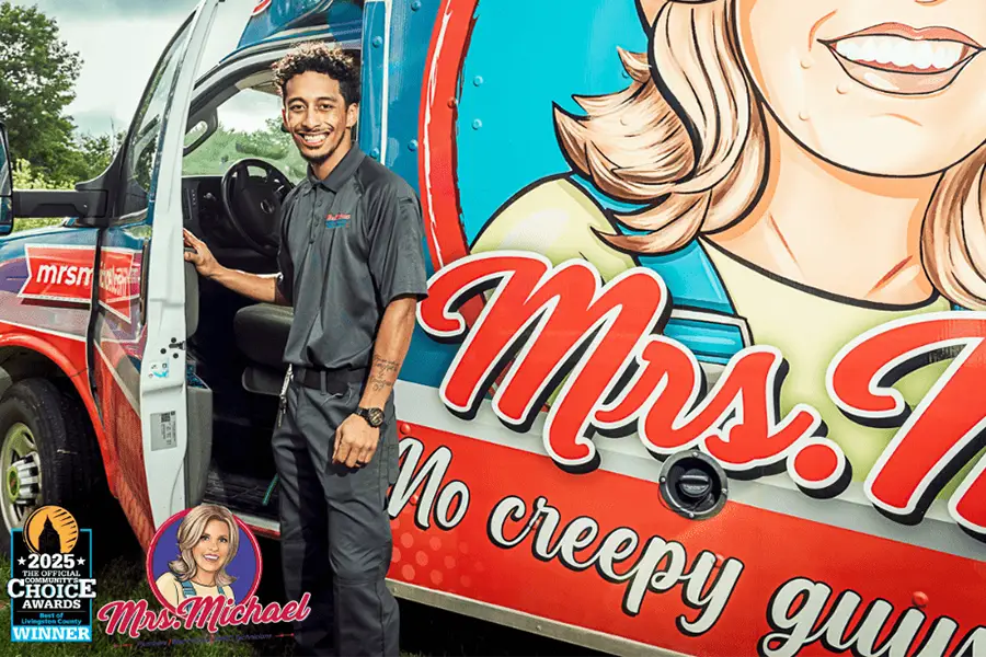 Plumber in a service van for drainage work