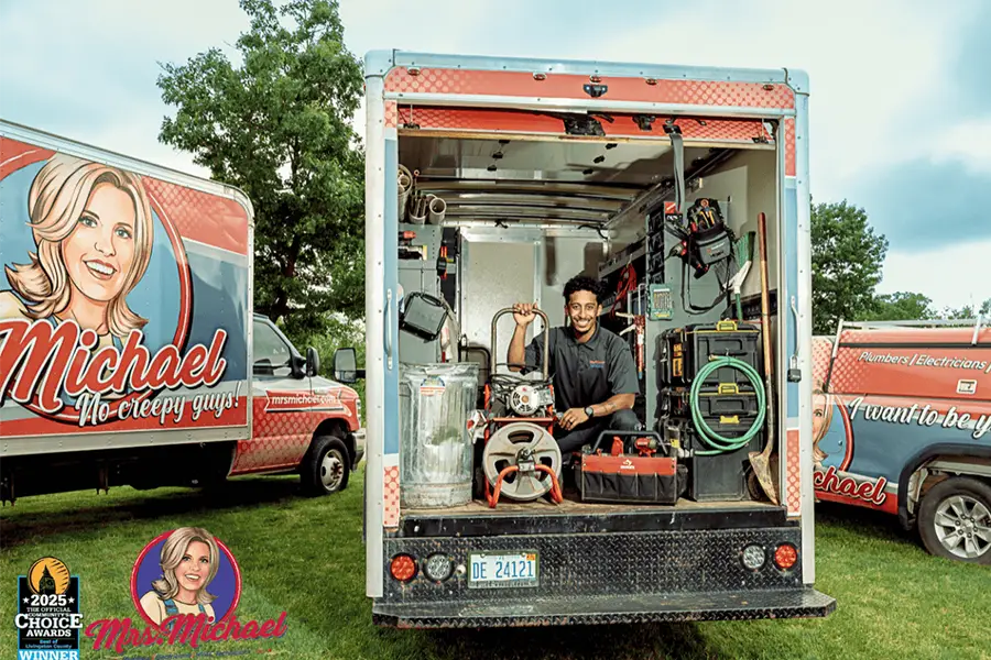 Professional plumber working in spring