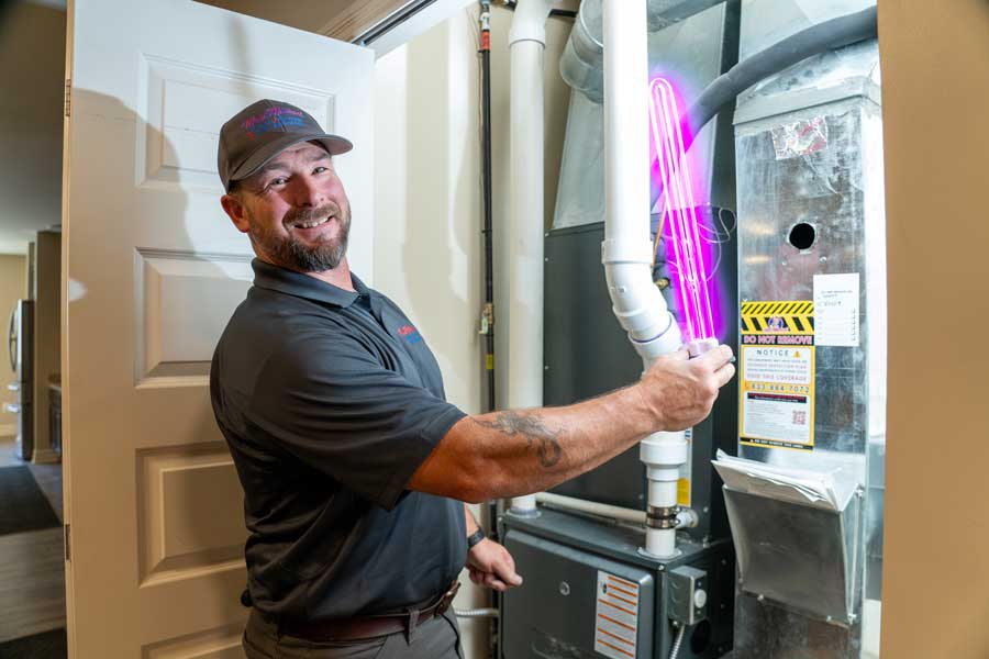 Technician improving indoor air quality